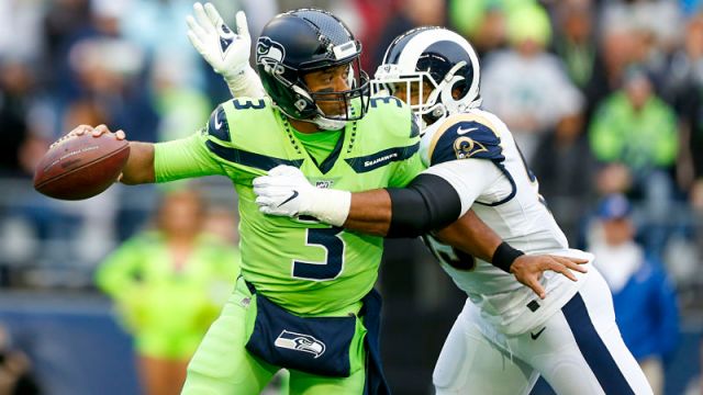 Seattle Seahawks quarterback Russell Wilson and Los Angeles Rams defensive lineman Aaron Donald