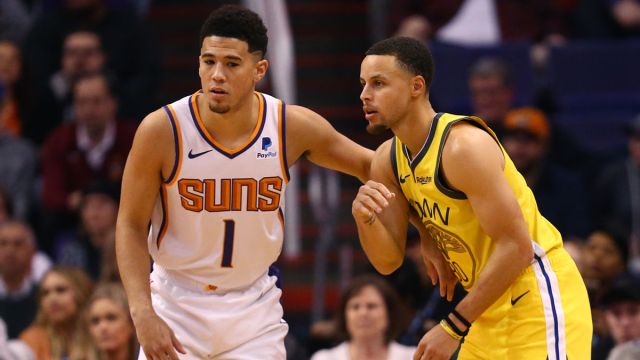 Phoenix Suns guard Devin Booker and Golden State Warriors guard Stephen Curry