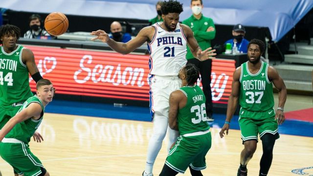 Boston Celtics guard Marcus Smart, Philadelphia 76ers center Joel Embiid