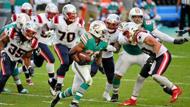New England Patriots defensive end Chase Winovich, Miami Dolphins running back Salvon Ahmed