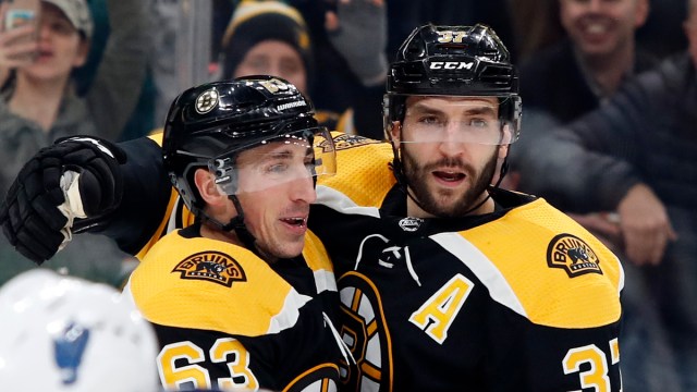 Boston Bruins Forwards Brad Marchand And Patrice Bergeron