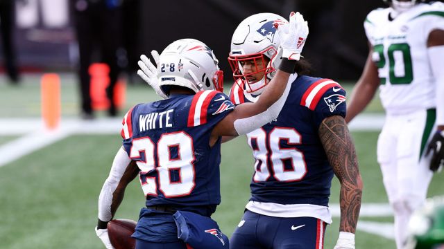 New England Patriots running back James White and tight end Devin Asiasi