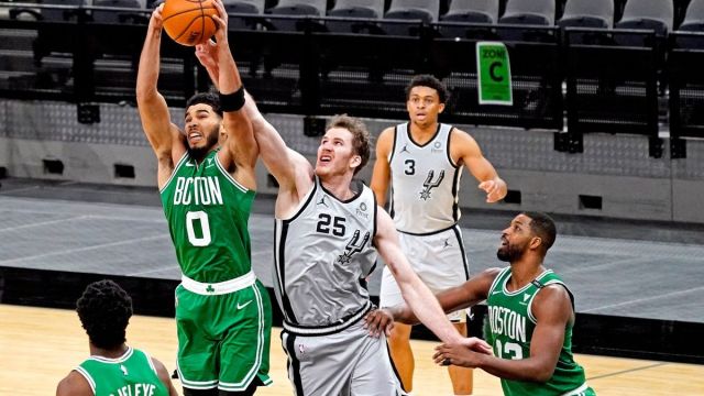 Boston Celtics forward Jayson Tatum, San Antonio Spurs center Jakob Poeltl