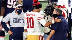 Patriots offensive coordinator Josh McDaniels, 49ers quarterback Jimmy Garoppolo, Patriots head coach Bill Belichick