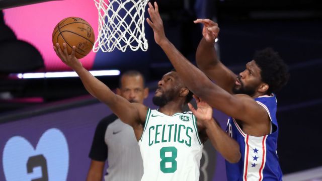 Boston Celtics guard Kemba Walker and Philadelphia 76ers forward Joel Embiid