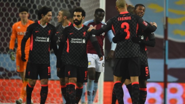 Liverpool midfielder Fabinho (3) and teammates