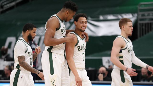 Milwaukee Bucks forward Giannis Antetokounmpo andg uard Bryn Forbes