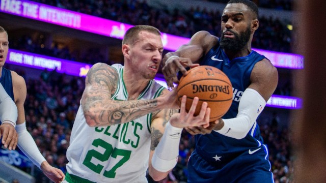 Dallas Mavericks guard Tim Hardaway Jr. and Boston Celtics center Daniel Theis