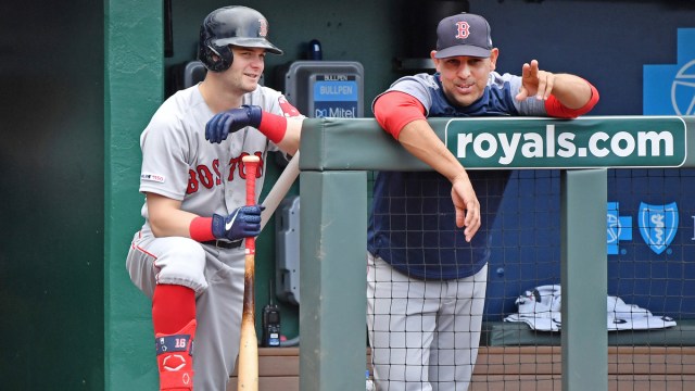Kansas City Royals Outfielder Andrew Benintendi And Boston Red Sox Manager Alex Cora