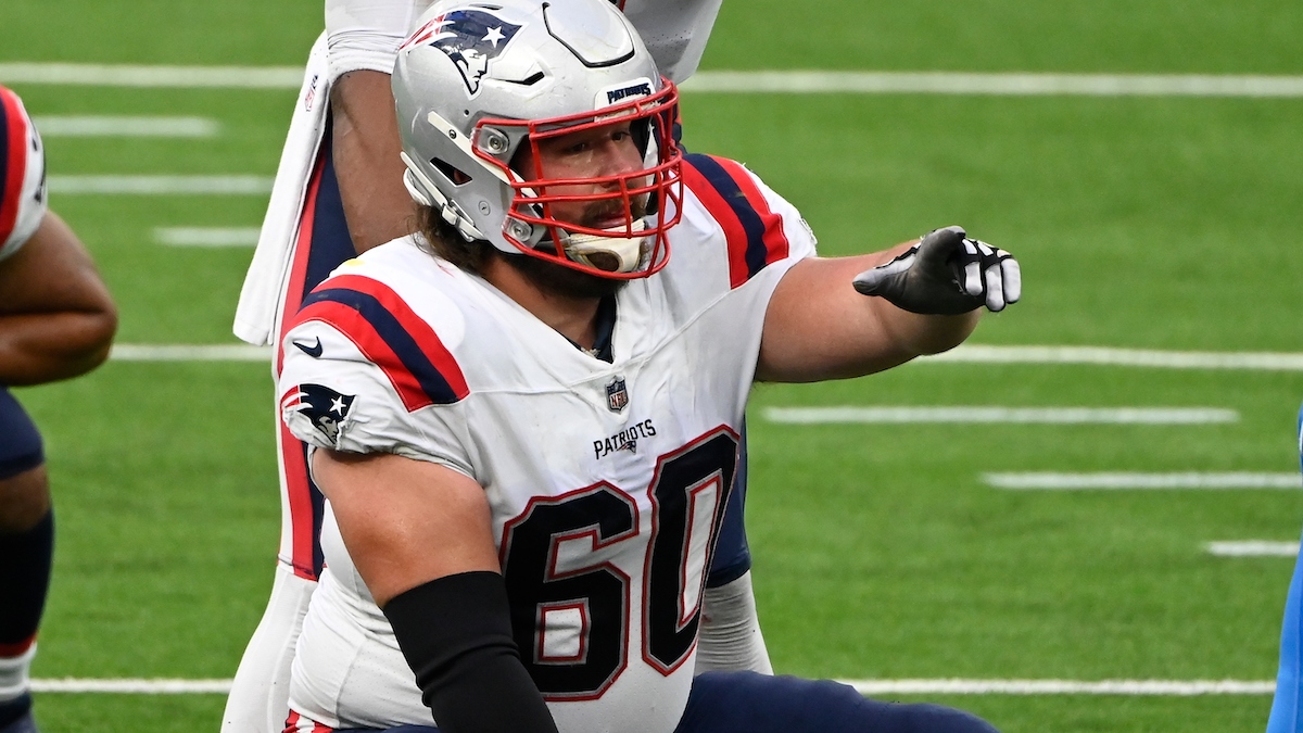 New England Patriots center David Andrews (60) walks off the field