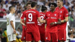 Bayern Munich forward Robert Lewandowski (9) and teammates