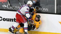 Boston Bruins center David Krejci, New York Rangers defenseman Ryan Lindgren