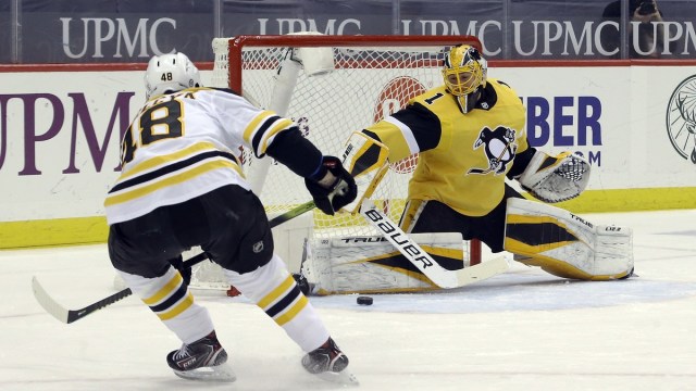 Pittsburgh Penguins goaltender Casey DeSmith, Boston Bruins defenseman Matt Grzelcyk