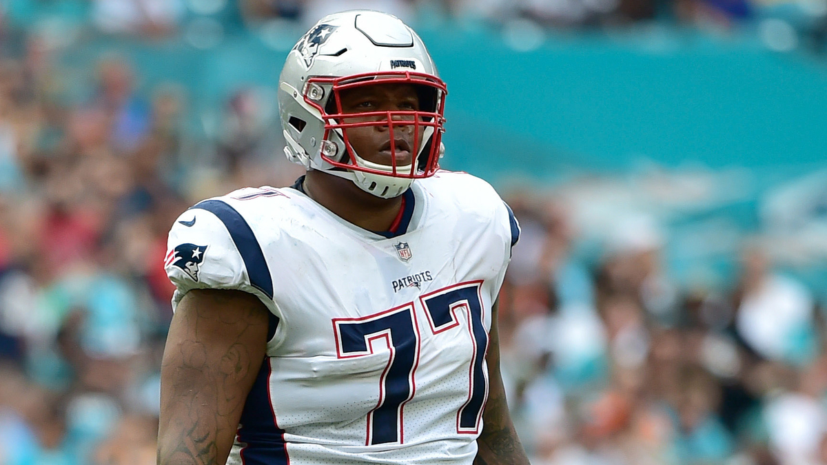 New England Patriots offensive lineman Trent Brown (77) stands on