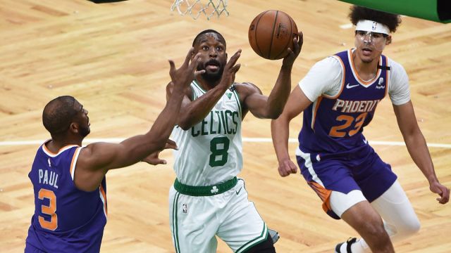 Phoenix Suns point guard Chris Paul and Boston Celtics point guard Kemba Walker