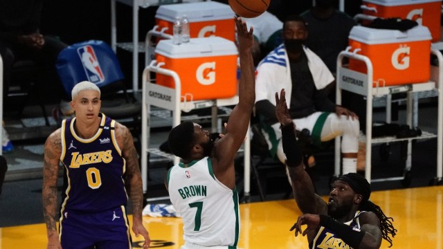 Boston Celtics guard Jaylen Brown (7) and Los Angeles Lakers center Montrezl Harrell (15)