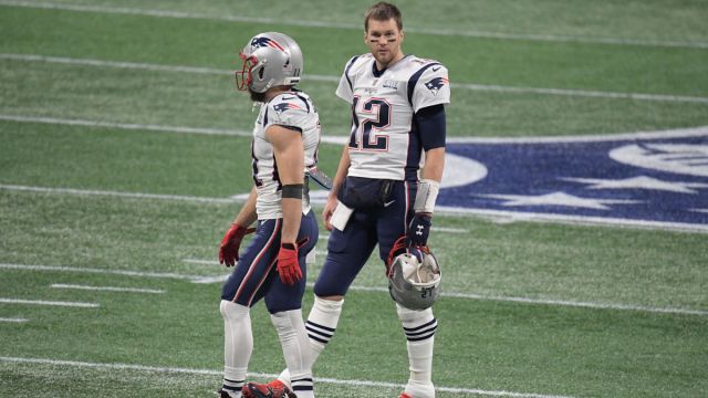 Former New England Patriots wide receiver Julian Edelman and Tampa Bay Buccaneers quarterback Tom Brady