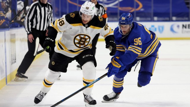Boston Bruins defenseman Matt Grzelcyk, Buffalo Sabres winger Anders Bjork