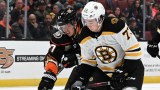 Boston Bruins defenseman Charlie McAvoy, Anahem Ducks winger Rickard Rakell