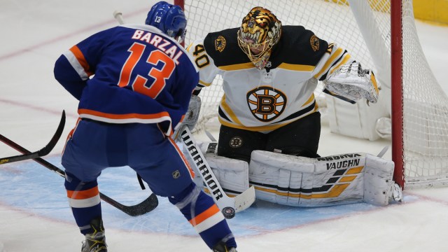 Boston Bruins goalie Tuukka Rask, New York Islanders center Mathew Barzal