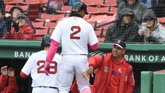 Boston Red Sox manager Alex Cora (right) and shortstop Xander Bogaerts (2)