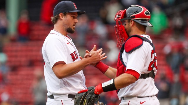 Boston Red Sox relief pitcher Josh Taylor and catcher Kevin Plawecki