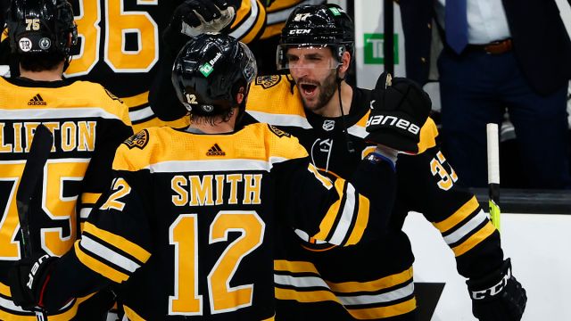 Boston Bruins right wing Craig Smith and center Patrice Bergeron
