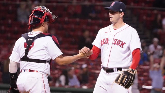 Boston Red Sox catcher Christian Vázquez and pitcher Garrett Whitlock (right)