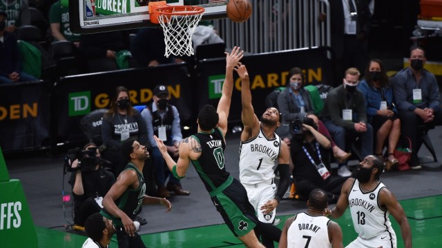 Boston Celtics forward Jayson Tatum (0), center Tristan Thompson (13) and Brooklyn Nets forward Bruce Brown (1)
