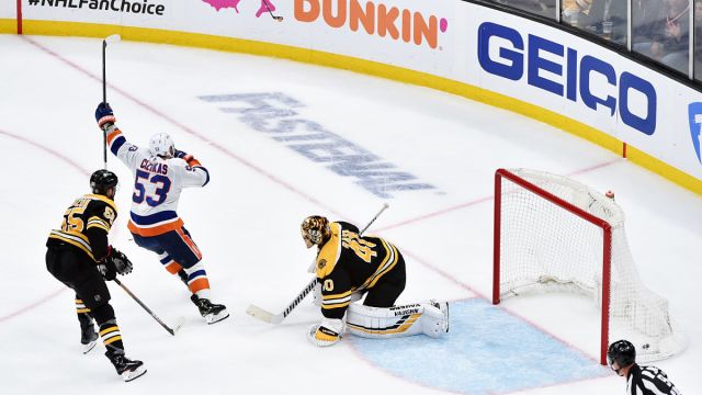 Boston Bruins defenseman Jeremy Lauzon, New York Islanders forward Casey Cizikas