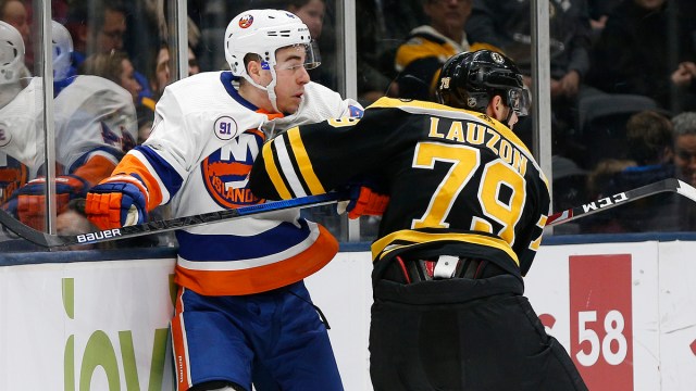 Boston Bruins defenseman Jeremy Lauzon, New York Islanders center Jean-Gabriel Pageau