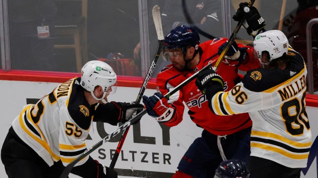 Boston Bruins defensemen Kevan Miller and Jeremy Lauzon, Washington Capitals winger Alex Ovechkin