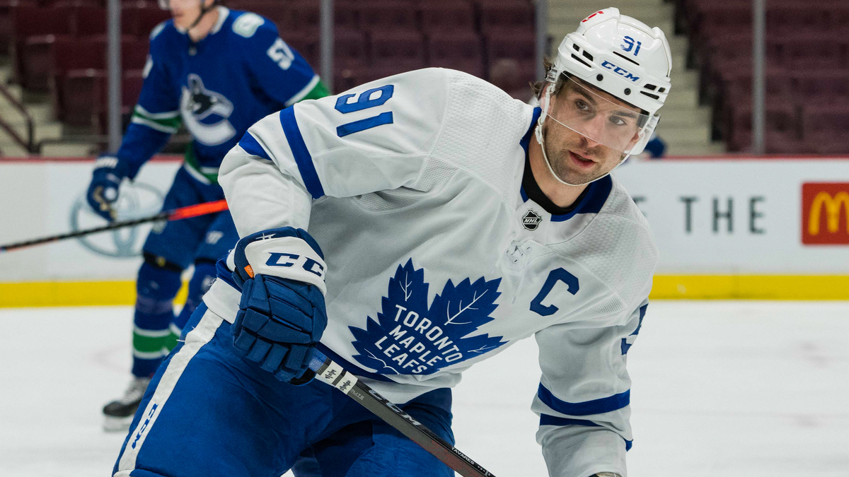 Maple Leafs' John Tavares stretchered off ice after collision