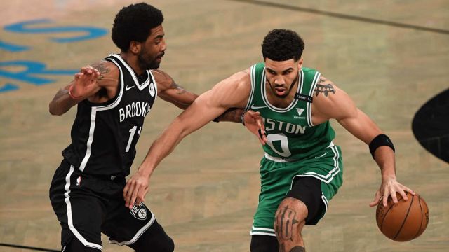 Brooklyn Nets guard Kyrie Irving and Boston Celtics forward Jayson Tatum