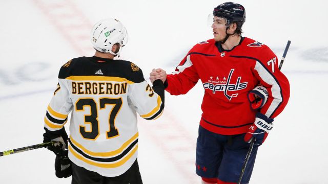 Boston Bruins center Patrice Bergeron and Washington Capitals right wing T.J. Oshie