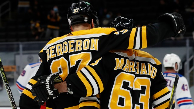 Boston Bruins Forwards Patrice Bergeron And Brad Marchand