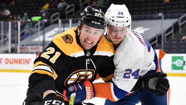Boston Bruins left wing Nick Ritchie, New York Islanders defenseman Nick Leddy
