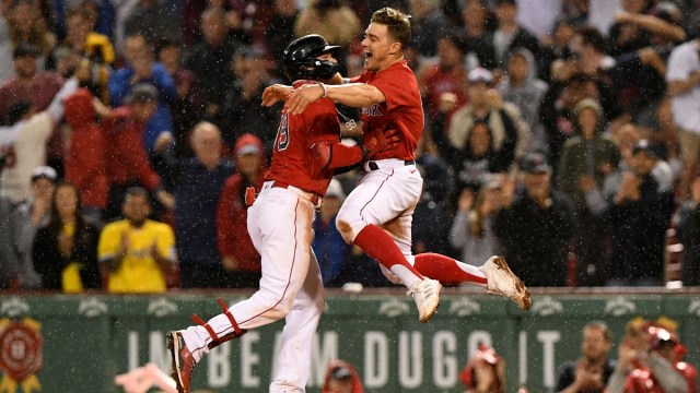 Boston Red Sox outfielders Alex Verdugo (left) and Kiké Hernández