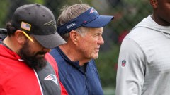 New England Patriots coach Bill Belichick (center)
