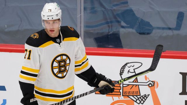 Bruins pummel Caps after 'cheap shot' injures Brandon Carlo