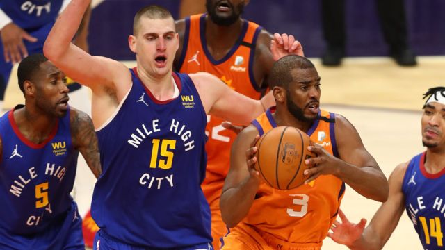Denver Nuggets forward Nikola Jokic and Phoenix Suns guard Chris Paul