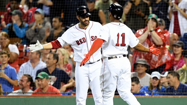Boston Red Sox third baseman Rafael Devers, designated hitter J.D. Martinez