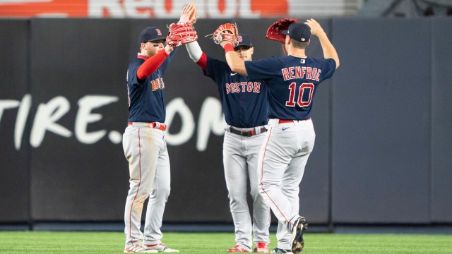 Boston Red Sox outfielders Kiké Hernandez, Alex Verdugo, Hunter Renfroe