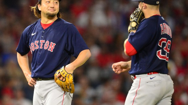 Boston Red Sox infielder Christian Arroyo and pitcher Hirokazu Sawamura