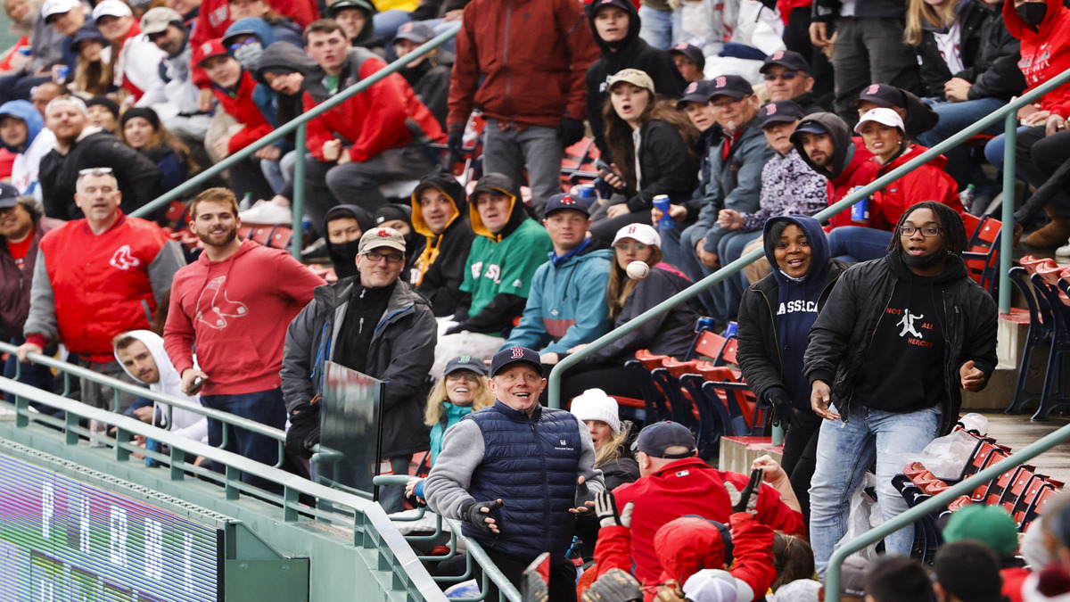Boston Red Sox fans react to team's 17-4 record while wearing