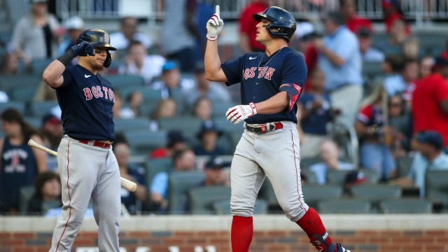 Boston Red Sox outfielder Hunter Renfroe (right) and catcher Christian Vázquez
