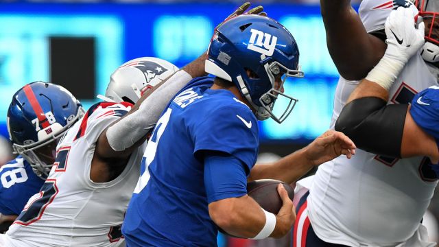 New England Patriots linebacker Josh Uche and New York Giants quarterback Daniel Jones
