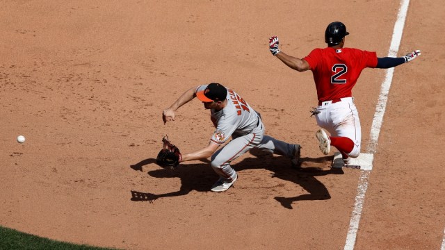 Boston Red Sox shortstop Xander Bogaerts (2) and Baltimore Orioles first baseman Trey Mancini (16)