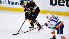 Boston Bruins center Charlie Coyle, New York Islanders forward Anthony Beauvillier