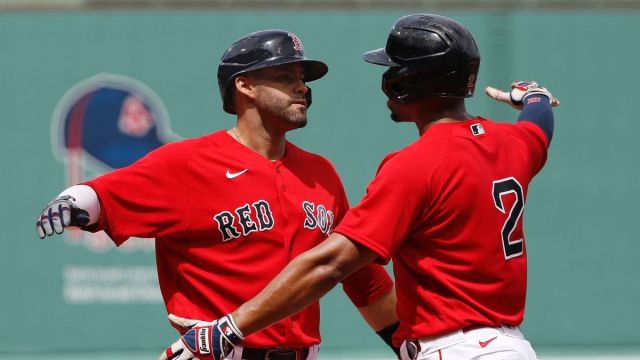 Boston Red Sox designated hitter J.D. Martinez, shortstop Xander Bogaerts